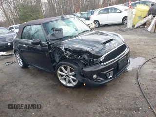 2013 MINI Convertible S with VIN WMWZP3C54DT297304, listed as a IAAI auction lot 41377572 with 101,991 mi miles and . Bid and sale history available at DreamBid. Image 1.