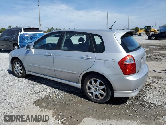 2005 Kia Spectra with VIN KNAFE162155081155, listed as a Copart auction lot 53893255 with 127,937 mi miles and Salvage Title. Bid and sale history available at carsss.com. Image 2.