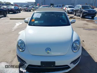 2019 Volkswagen Beetle S with VIN 3VW5DAAT0KM507437, listed as a IAAI auction lot 41380821 with 28,010 mi miles and . Bid and sale history available at DreamBid. Image 12.