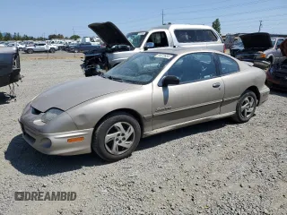 2002 Pontiac Sunfire SE z VIN 1G2JB124327288986, wystawiony jako Copart lot #64072634 z przebiegiem 122 306 mil mil oraz Szkody całkowita. Historia ofert i sprzedaży dostępna na DreamBid. Obrazek 1.