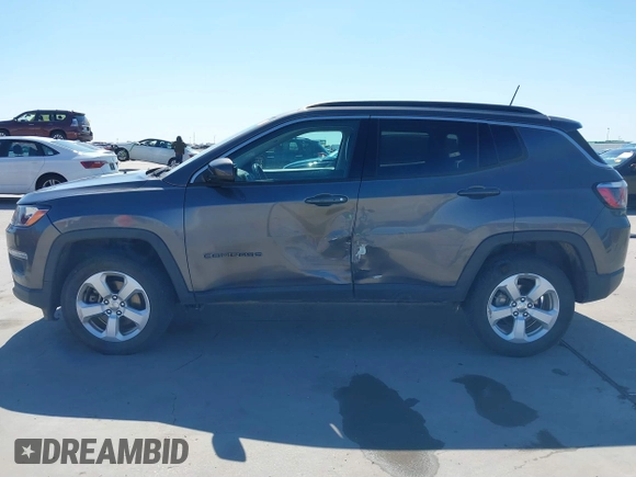 2018 Jeep Compass Altitude with VIN 3C4NJDBBXJT185252, listed as a IAAI auction lot 41847785 with 126,915 mi miles and . Bid and sale history available at carsss.com. Image 15.