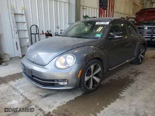 2012 Volkswagen Beetle 2.0T Turbo PZEV with VIN 3VWVA7AT1CM656081, listed as a Copart auction lot 43027995 with 63,802 mi miles and Clean Title. Bid and sale history available at carsss.com. Image 1.