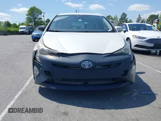2017 Toyota Prius Two with VIN JTDKARFU4H3051645, listed as a IAAI auction lot 41991804 with 301,338 mi miles. Bid and sale history available at carsss.com. Image 6.