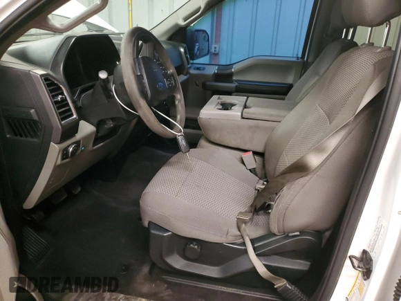 2015 Ford F-150 XLT with VIN 1FTEW1EF6FFB70702, listed as a Copart auction lot 58165445 with 177,616 mi miles and Salvage title. Bid and sale history available at DreamBid. Image 7.