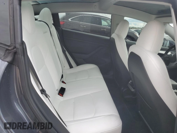2023 Tesla Model 3 with VIN 5YJ3E1EA3PF672023, listed as a Copart auction lot 57571645 with 18,115 mi miles and Salvage title. Bid and sale history available at DreamBid. Image 10.