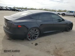 2020 Tesla Model S Performance with VIN 5YJSA1E49LF390948, listed as a Copart auction lot 47313715 with 95,143 mi miles and Salvage title. Bid and sale history available at DreamBid. Image 3.