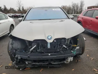 2023 BMW iX xDrive50 with VIN WB523CF03PCM84985, listed as a Copart auction lot 44174314 with 2,220 mi miles. Bid and sale history available at carsss.com. Image 5.