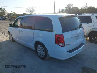2014 Dodge Grand Caravan SE with VIN 2C4RDGBG1ER220534, listed as a IAAI auction lot 41262990 with 77,851 mi miles and . Bid and sale history available at DreamBid. Image 3.