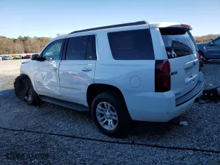 2017 Chevrolet Tahoe LS with VIN 1GNSCAKC7HR355274, listed as a Copart auction lot 85271454 with 104,897 mi miles and Salvage Title. Bid and sale history available at carsss.com. Image 2.