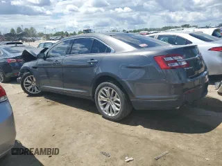 2015 Ford Taurus Limited z VIN 1FAHP2F87FG170997, wystawiony jako Copart lot #54346554 z przebiegiem Nie podano mil oraz Szkoda całkowita • Salvage title. Historia ofert i sprzedaży dostępna na DreamBid. Obrazek 2.