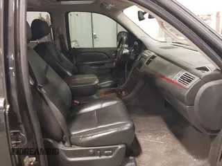 2010 Cadillac Escalade Premium with VIN 1GYUKCEF4AR201742, listed as a IAAI auction lot 41378437 with 137,622 mi miles and . Bid and sale history available at DreamBid. Image 5.