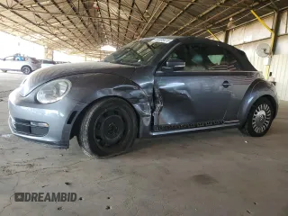 2016 Volkswagen Beetle Denim с VIN 3VW507AT8GM802601, выставлен на аукционе Copart как лот 60335415 с пробегом 71 163 миль миль и Списание • Salvage title. История ставок и продаж доступна на DreamBid. Изображение 1.