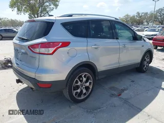 2014 Ford Escape Titanium с VIN 1FMCU0J9XEUB93591, выставлен на аукционе IAAI как лот 41721869 с пробегом 98 859 миль миль и . История ставок и продаж доступна на DreamBid. Изображение 4.