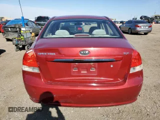 2009 Kia Spectra EX with VIN KNAFE221395656476, listed as a Copart auction lot 77700844 with 90,079 mi miles and Salvage Title. Bid and sale history available at carsss.com. Image 6.