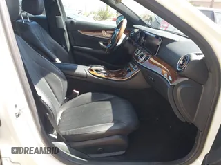 2019 Mercedes-Benz E-Class E 300 with VIN WDDZF4JBXKA597397, listed as a IAAI auction lot 41724672 with 99,258 mi miles. Bid and sale history available at carsss.com. Image 5.