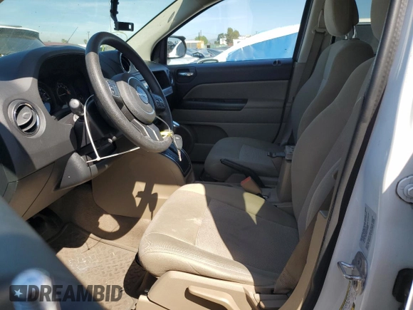 2016 Jeep Compass Sport with VIN 1C4NJDBB4GD511836, listed as a Copart auction lot 49989595 with 106,850 mi miles and Salvage Title. Bid and sale history available at carsss.com. Image 7.