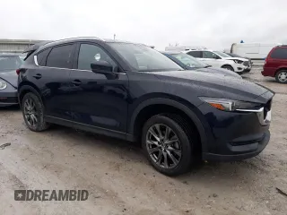 2021 Mazda CX-5 Signature with VIN JM3KFBEY8M0436075, listed as a Copart auction lot 85061194 with 66,471 mi miles and Salvage Title. Bid and sale history available at carsss.com. Image 4.