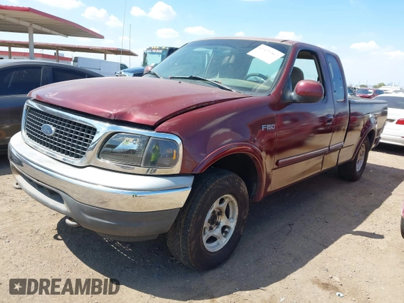 1997 Ford F-150 z VIN 2FTDX18WXVCA51615, wystawiony jako IAAI lot #42425367 z przebiegiem 160 402 mil mil oraz . Historia ofert i sprzedaży dostępna na DreamBid. Obrazek 2.