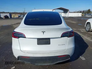 2022 Tesla Model Y Long Range with VIN 7SAYGDEE2NF440548, listed as a IAAI auction lot 41360276 with 19,714 mi miles and . Bid and sale history available at carsss.com. Image 16.