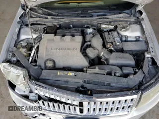 2009 Lincoln MKZ z VIN 3LNHM26T89R630393, wystawiony jako Copart lot #55234315 z przebiegiem 133 795 mil mil oraz Szkoda całkowita • Salvage title. Historia ofert i sprzedaży dostępna na DreamBid. Obrazek 11.