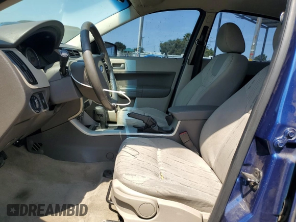 2009 Ford Focus SE with VIN 1FAHP35N09W168306, listed as a Copart auction lot 70276634 with 145,844 mi miles and Salvage Title. Bid and sale history available at carsss.com. Image 7.