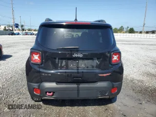 2020 Jeep Renegade Trailhawk z VIN ZACNJBC18LPM03643, wystawiony jako Copart lot #52447165 z przebiegiem 61 523 mil mil oraz Nie do naprawy • Non repairable. Historia ofert i sprzedaży dostępna na DreamBid. Obrazek 6.