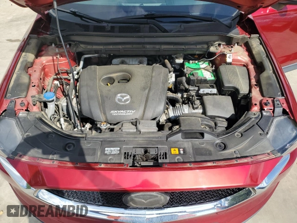 2019 Mazda CX-5 Grand Touring with VIN JM3KFADM2K1657915, listed as a Copart auction lot 56647145 with 85,095 mi miles and Salvage title. Bid and sale history available at DreamBid. Image 12.