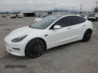 2021 Tesla Model 3 Performance z VIN 5YJ3E1EC2MF935826, wystawiony jako Copart lot #50729465 z przebiegiem 66 070 mil mil oraz Szkoda całkowita • Salvage title. Historia ofert i sprzedaży dostępna na DreamBid. Obrazek 1.