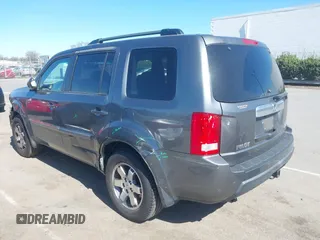 2010 Honda Pilot Touring with VIN 5FNYF4H94AB031167, listed as a IAAI auction lot 41800738 with 184,126 mi miles and . Bid and sale history available at carsss.com. Image 3.