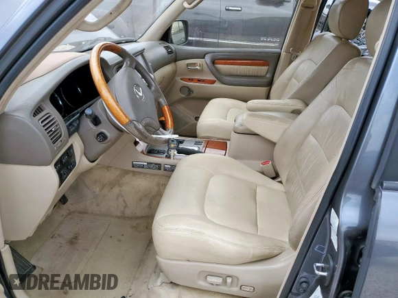 2003 Lexus LX 470 z VIN JTJHT00W033530306, wystawiony jako Copart lot #57162675 z przebiegiem 185 458 mil mil oraz Szkoda całkowita • Salvage title. Historia ofert i sprzedaży dostępna na DreamBid. Obrazek 7.