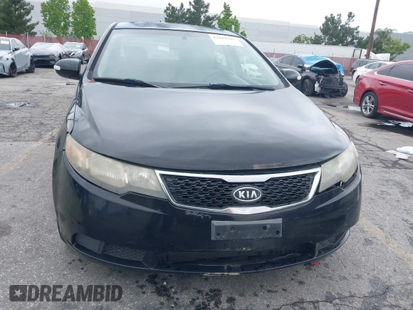 2012 Kia Forte EX with VIN KNAFU4A28C5490102, listed as a IAAI auction lot 42164395 with 167,444 mi miles. Bid and sale history available at carsss.com. Image 6.