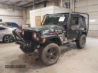 1999 Jeep Wrangler Sahara z VIN 1J4FY49S4XP432567, wystawiony jako IAAI lot #41562455 z przebiegiem Nie podano mil oraz . Historia ofert i sprzedaży dostępna na DreamBid. Obrazek 17.