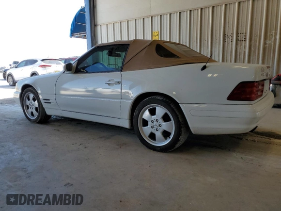 1999 Mercedes-Benz SL-Class with VIN WDBFA68F2XF179134, listed as a Copart auction lot 67335014 with 68,406 mi miles and Clean Title. Bid and sale history available at carsss.com. Image 2.