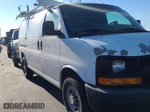 2013 Chevrolet Express Cargo with VIN 1GCWGFCA6D1142155, listed as a IAAI auction lot 42670323 with 213,723 mi miles and . Bid and sale history available at DreamBid. Image 2.