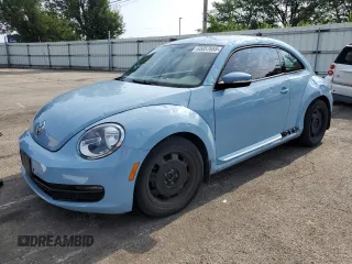 2015 Volkswagen Beetle 1.8T w/Sun with VIN 3VWJ07AT0FM634692, listed as a Copart auction lot 65057655 with 74,755 mi miles and Clean title. Bid and sale history available at DreamBid. Image 1.
