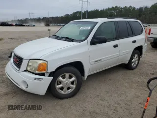 2004 GMC Envoy SLE with VIN 1GKDS13S042166838, listed as a Copart auction lot 43651635 with 165,326 mi miles and Salvage Title. Bid and sale history available at carsss.com. Image 1.