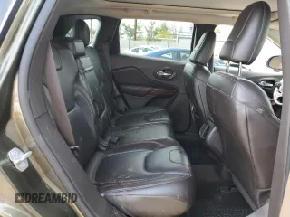 2015 Jeep Cherokee Trailhawk with VIN 1C4PJMBSXFW687205, listed as a Copart auction lot 53128545 with 86,876 mi miles and Salvage Title. Bid and sale history available at carsss.com. Image 11.
