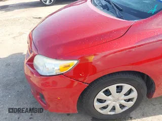 2013 Toyota Corolla L with VIN 5YFBU4EE4DP171631, listed as a IAAI auction lot 42185923 with 87,892 mi miles and . Bid and sale history available at DreamBid. Image 6.