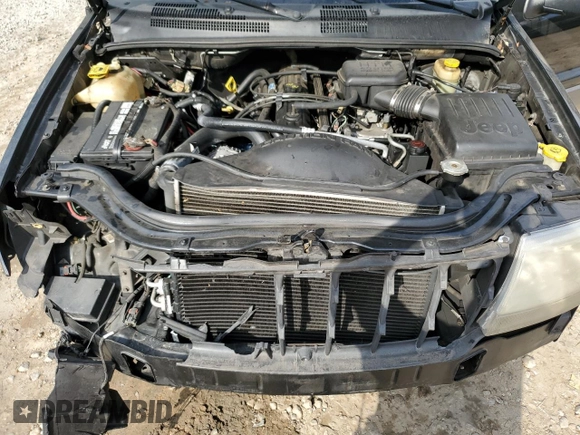 2003 Jeep Grand Cherokee Laredo with VIN 1J4GX48S43C609354, listed as a Copart auction lot 43924595 with 212,949 mi miles and Salvage Title. Bid and sale history available at carsss.com. Image 12.