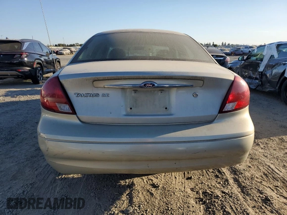 2003 Ford Taurus SE Standard with VIN 1FAFP53U13G188188, listed as a Copart auction lot 73574624 with 95,017 mi miles and Salvage Title. Bid and sale history available at DreamBid. Image 6.