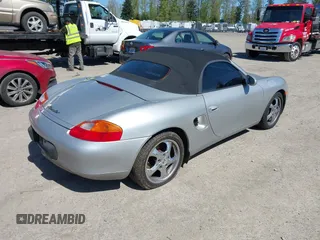 1998 Porsche Boxster с VIN WP0CA2983WU624195, выставлен на аукционе IAAI как лот 42036411 с пробегом 159 202 миль миль и . История ставок и продаж доступна на DreamBid. Изображение 4.