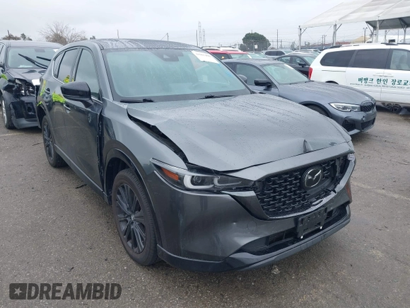 2022 Mazda CX-5 2.5 Turbo with VIN JM3KFBAY8N0647204, listed as a IAAI auction lot 41567490 with 40,396 mi miles and . Bid and sale history available at carsss.com. Image 1.