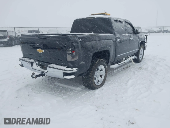 2014 Chevrolet Silverado 1500 LTZ with VIN 3GCUKSEC5EG291026, listed as a IAAI auction lot 41286574 with 124,615 mi miles and . Bid and sale history available at DreamBid. Image 4.
