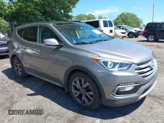 2017 Hyundai Santa Fe Ultimate z VIN 5XYZW4LA6HG401222, wystawiony jako IAAI lot #42319445 z przebiegiem 111 877 mil mil oraz . Historia ofert i sprzedaży dostępna na DreamBid. Obrazek 1.