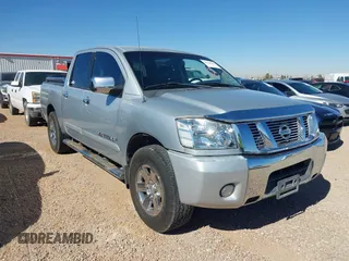 2011 Nissan Titan SV with VIN 1N6BA0ED7BN318878, listed as a IAAI auction lot 41518618 with 169,890 mi miles and . Bid and sale history available at DreamBid. Image 13.