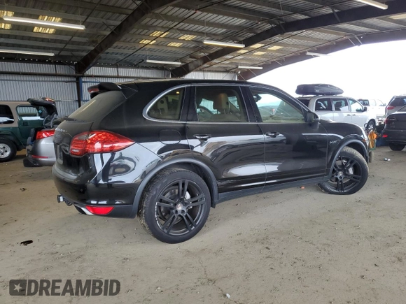 2012 Porsche Cayenne S Hybrid z VIN WP1AE2A28CLA93269, wystawiony jako Copart lot #45205745 z przebiegiem 72 949 mil mil oraz Szkody całkowita. Historia ofert i sprzedaży dostępna na DreamBid. Obrazek 3.