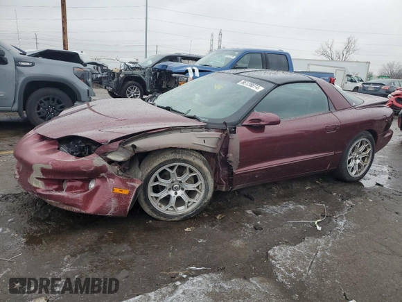 2001 Pontiac Firebird Firebird z VIN 2G2FS22K112122739, wystawiony jako Copart lot #86128074 z przebiegiem 271 969 mil mil oraz Czysty tytuł • Clean title. Historia ofert i sprzedaży dostępna na DreamBid. Obrazek 1.