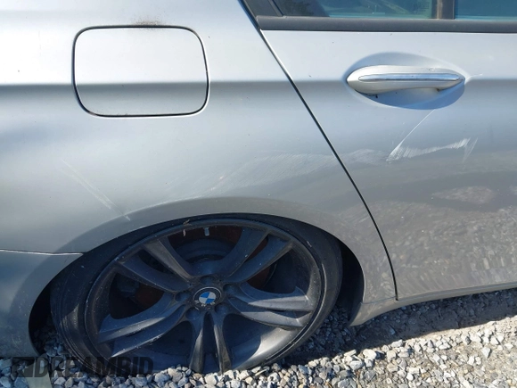 2013 BMW 7 Series 750Li with VIN WBAYE8C50DD133041, listed as a IAAI auction lot 42280002 with Not provided miles and . Bid and sale history available at DreamBid. Image 18.