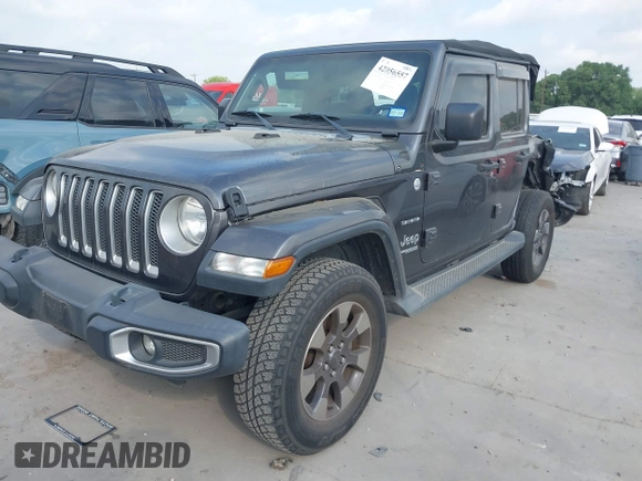 2018 Jeep Wrangler Unlimited Sahara z VIN 1C4HJXEG5JW194523, wystawiony jako IAAI lot #42056557 z przebiegiem 71 141 mil mil oraz . Historia ofert i sprzedaży dostępna na DreamBid. Obrazek 19.