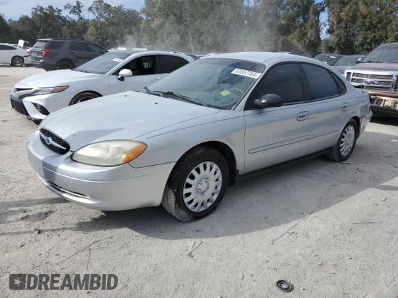 2003 Ford Taurus LX Standard z VIN 1FAFP52U43A110444, wystawiony jako Copart lot #83557764 z przebiegiem 118 897 mil mil oraz Szkoda całkowita • Salvage title. Historia ofert i sprzedaży dostępna na DreamBid. Obrazek 1.